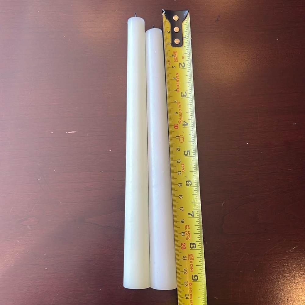Used 9in candles white and off white.